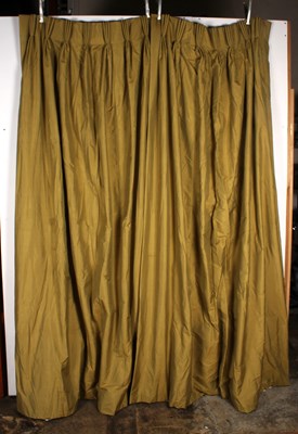Lot 556 - A pair of green long drop curtains, approx 250...