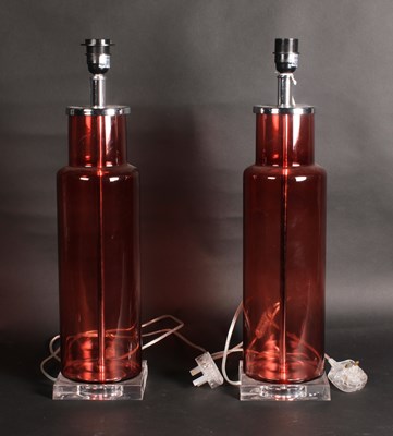 Lot 625 - A pair of modern cranberry glass table lamps