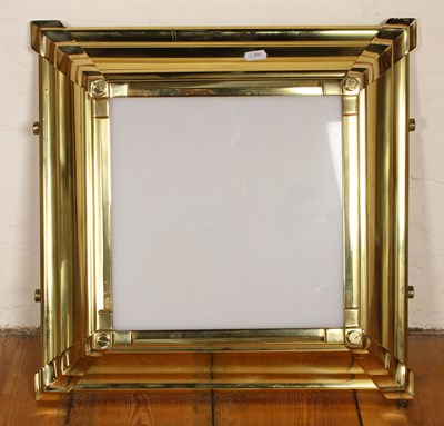 Lot 343 - A heavy brass plinth, having an in-built lamp