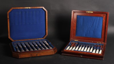 Lot 235 - A canteen of fish knives, the case bearing the...