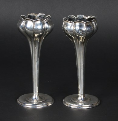 Lot 39 - A pair of Arts and Crafts silver vases, each...