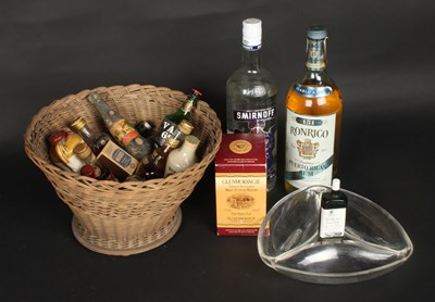 Lot 245 - A collection of spirits including four bottles...