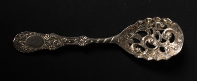 Lot 110 - A fine pierced silver sifting spoon, Charles...