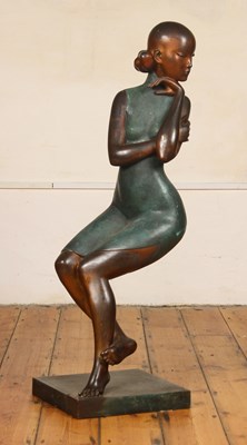 Lot 228 - A large Chinese patinated and polished bronze...