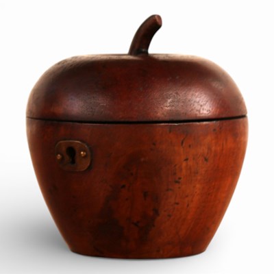 Lot 596 - A carved wooden tea caddy, in the form of an...
