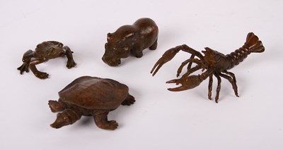 Lot 117 - A collection of Japanese miniature bronzes, in...