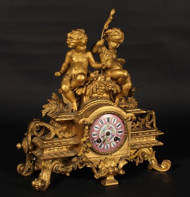 Lot 212 - A 19th century French gilt metal mantel clock,...
