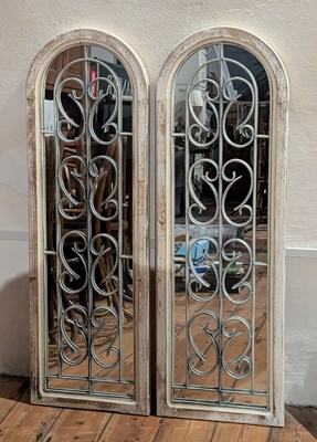 Lot 574 - A pair of white painted wood garden wall mirrors