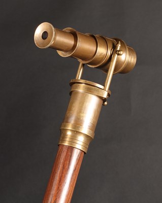 Lot 188 - A wooden walking stick, having an adjustable...