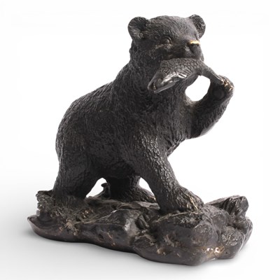 Lot 317 - A bronze model of a bear with a salmon