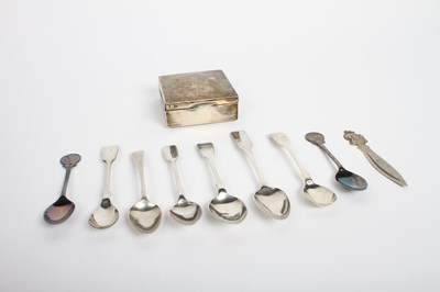 Lot 26 - A collection of silver flatwares and a table...