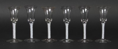 Lot 30 - A set of six wine glasses, circa 1770, the...