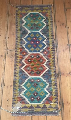 Lot 566 - A Chobi Kilim Runner, with geometric decoration