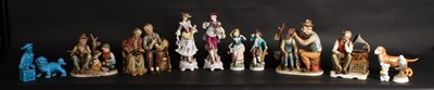 Lot 173 - A collection of porcelain figurines, including...