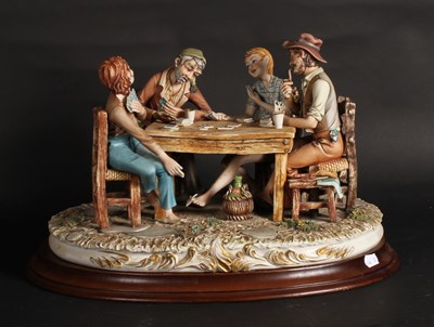 Lot 174 - A large Capodimonte porcelain figure of two...
