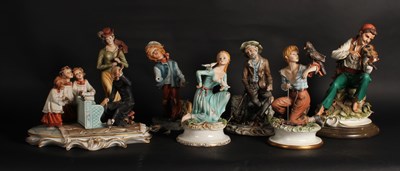 Lot 754 - A collection of Capodimonte porcelain figures,...