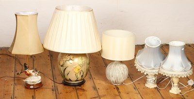Lot 423 - A collection of five lamps including one by...