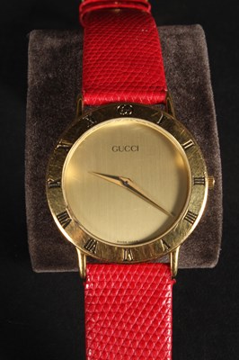 Lot 65 - A Gucci 3000 Series gold colour stainless...