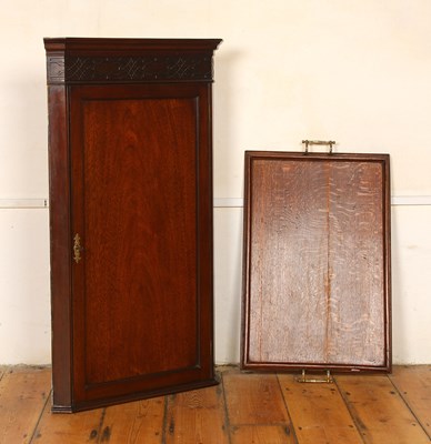 Lot 511 - A George III mahogany corner cupboard,...