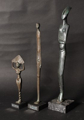 Lot 260 - Three various stylised bronze figures