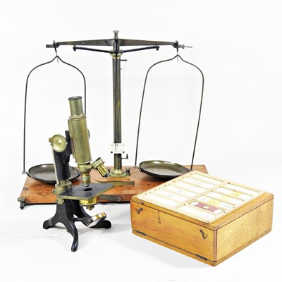 Lot 489 - A 19th century brass mounted microscope, 29cm...
