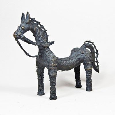 Lot 485 - An Indian bronze Dhokra model of a horse, 26cm...