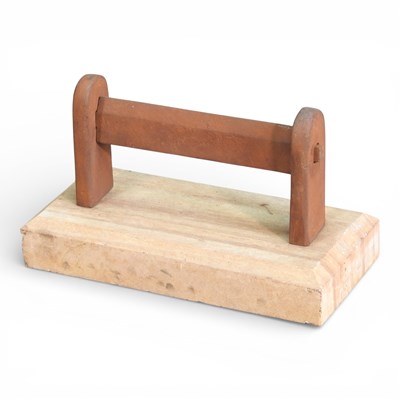 Lot 181 - A metal bootscraper, on a sandstone base, 38cm...
