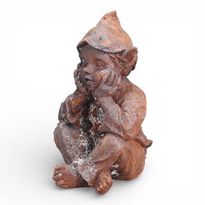 Lot 394 - A rusted garden statue of a seated goblin,...