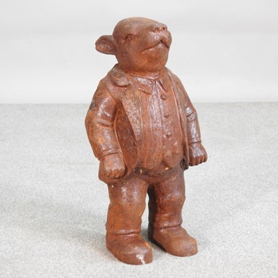 Lot 201 - A rusted garden statue of Mr Badger, 42cm high