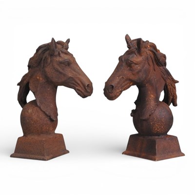 Lot 293 - A pair of rusted metal gate post finials, each...