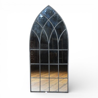 Lot 131 - A metal arched garden mirror