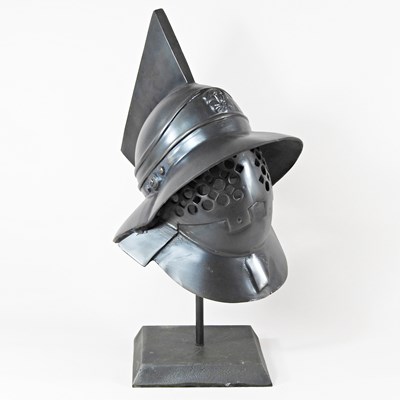 Lot 620 - A replica suit of armour helmet, on stand,...