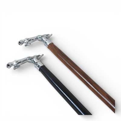 Lot 223 - A Jaguar walking stick, together with another (2)