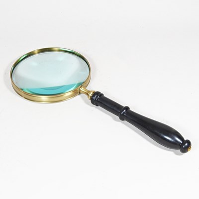 Lot 515 - A large modern table magnifying glass, with a...