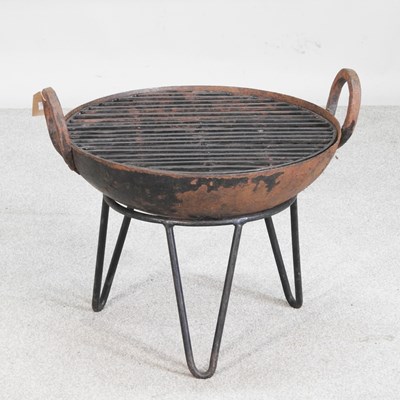 Lot 171 - A small metal kadai on stand, 49cm high