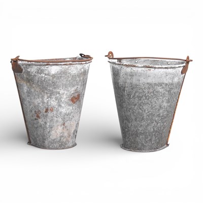 Lot 209 - A pair of metal wall planters, each in the...