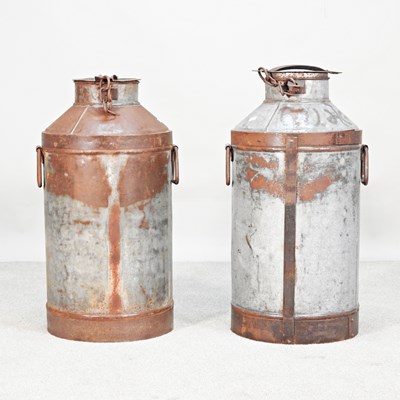 Lot 246 - A pair of metal churns, each 66cm high (2)