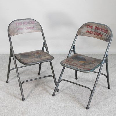 Lot 514 - A pair of painted metal folding chairs (2)