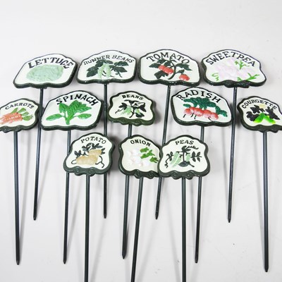 Lot 138 - A set of six painted cast iron salad markers,...