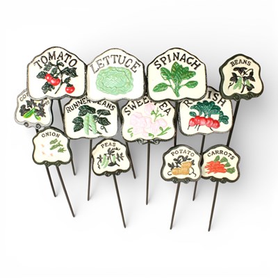 Lot 252 - A set of six painted metal herb markers,...