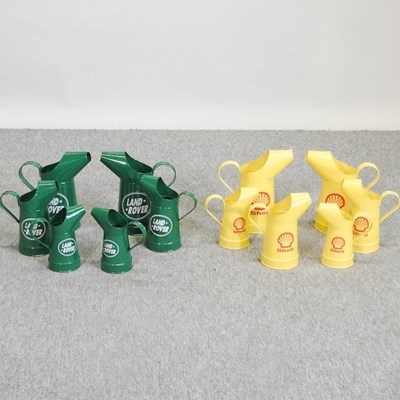 Lot 523 - A set of five graduated Shell oil cans,...