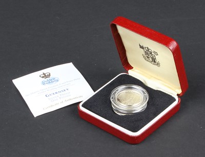 Lot 114 - A 1997 UK silver Guernsey proof one pound coin,...