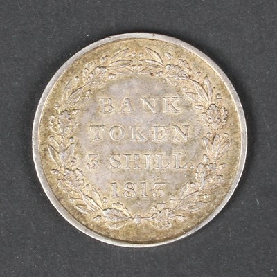 Lot 134 - An 1813 three shilling bank token