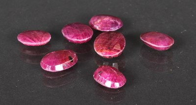 Lot 46 - A collection of six loose rubies, oval shaped...