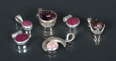 Lot 63 - A collection of silver necklace pendants,...