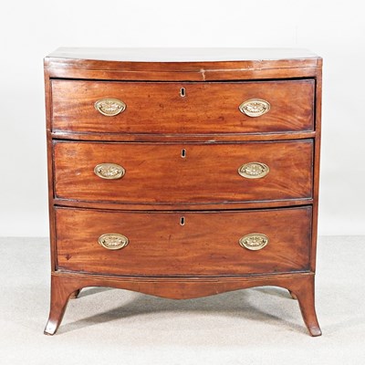 Lot 424 - A 19th century mahogany bow front chest of...
