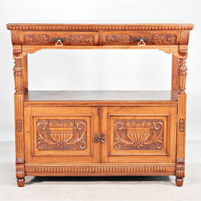 Lot 503 - A 19th century carved walnut buffet, with...
