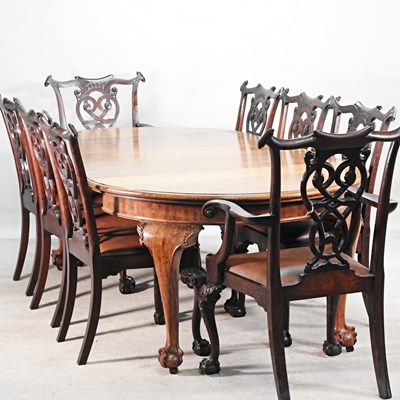 Lot 285 - An early 20th century walnut dining table, by...
