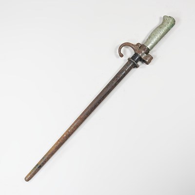 Lot 84 - A French epee bayonet, in a metal scabbard,...