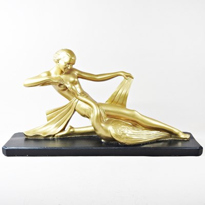Lot 62 - An Art Deco and later painted plaster figure...